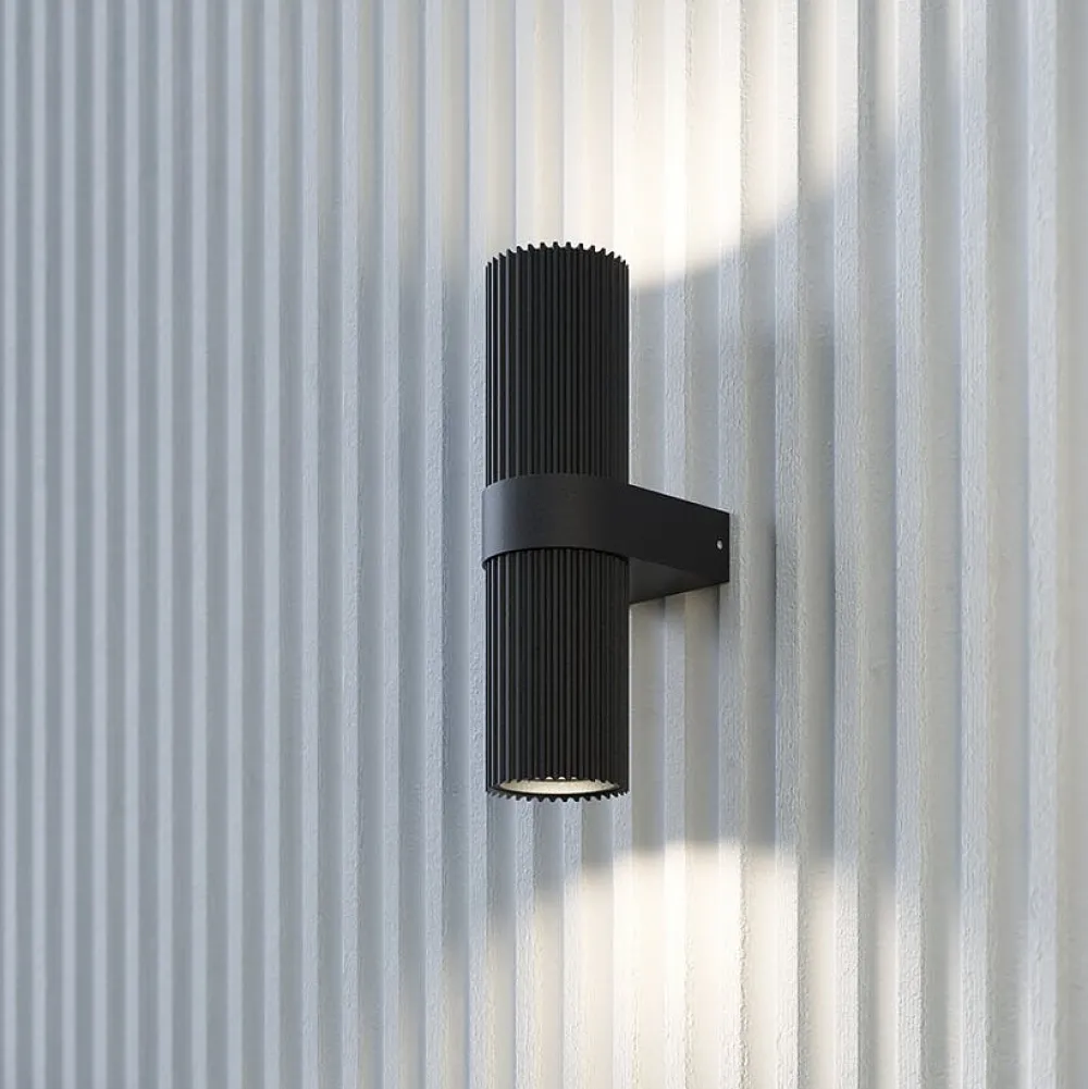 Appliques|TAVA Applique design noire – cylindre cranté vertical