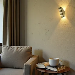 Appliques|MESA Applique murale dorée – forme pliée, éclairage haut bas 