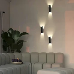 Appliques|MESA Applique murale dorée – forme pliée, éclairage haut bas 